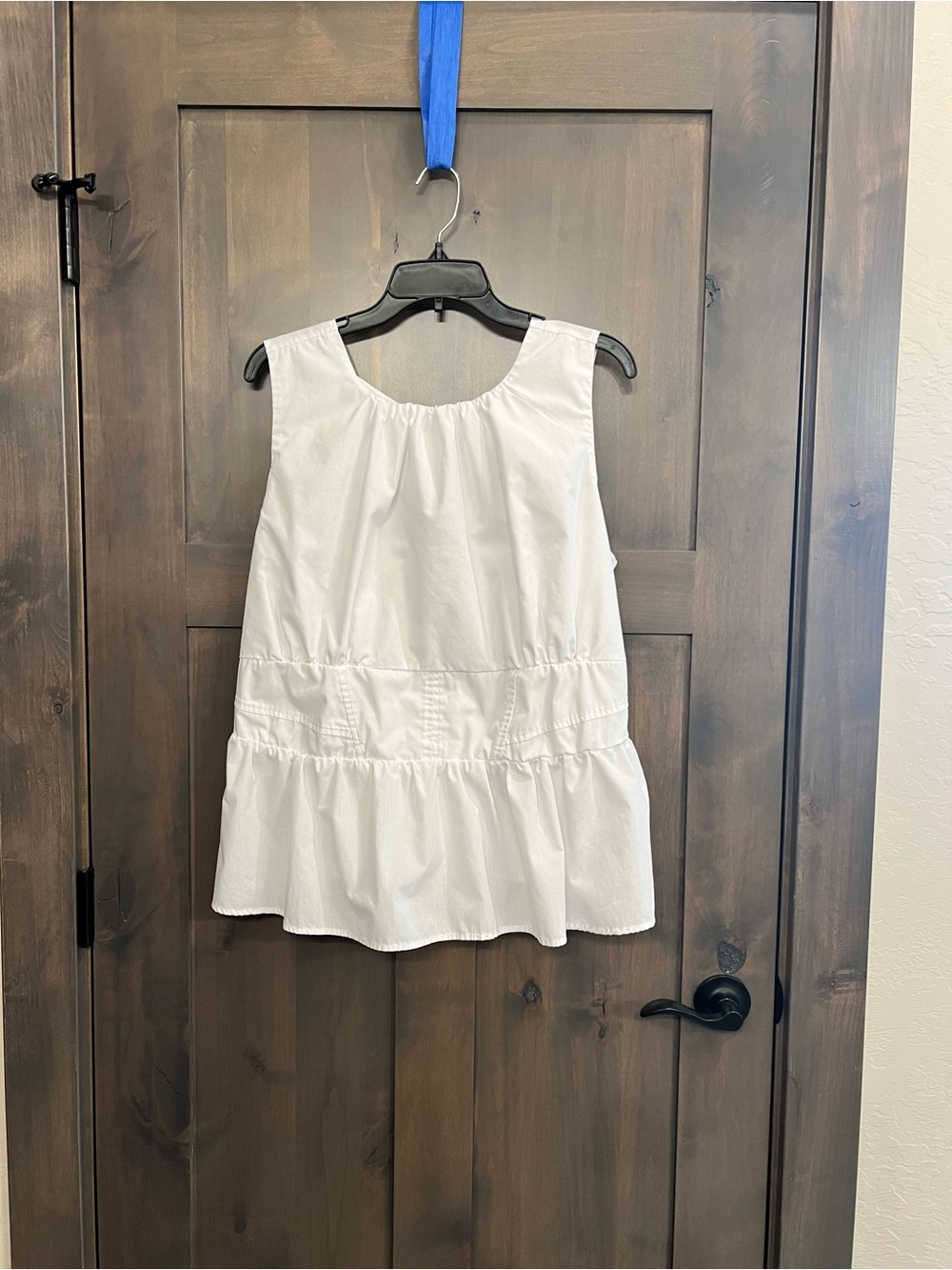 Women's White Sleeveless Peplum Ruffle-Hem Blouse